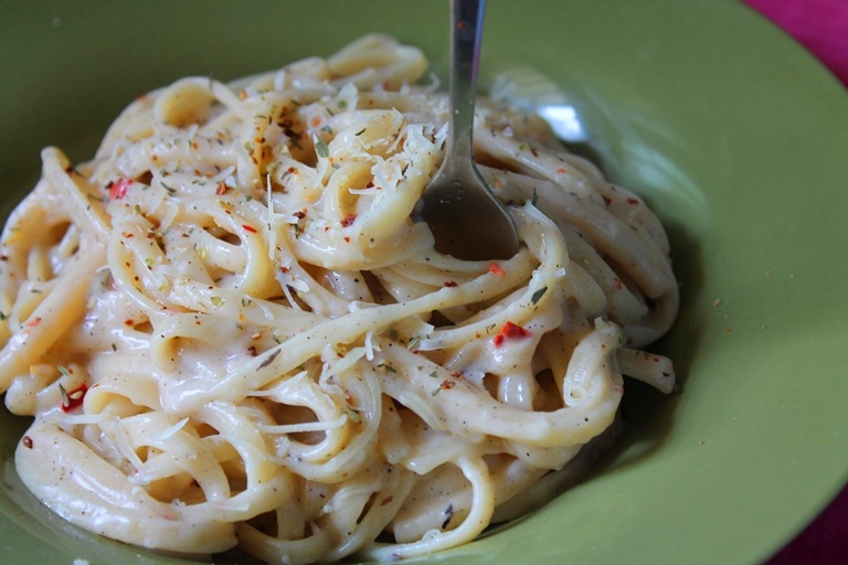 close shot of creamy white pasta recipe