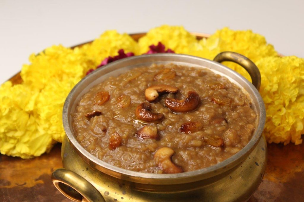 sweet pongal also known as sakkarai pongal served on special occasion with flowers