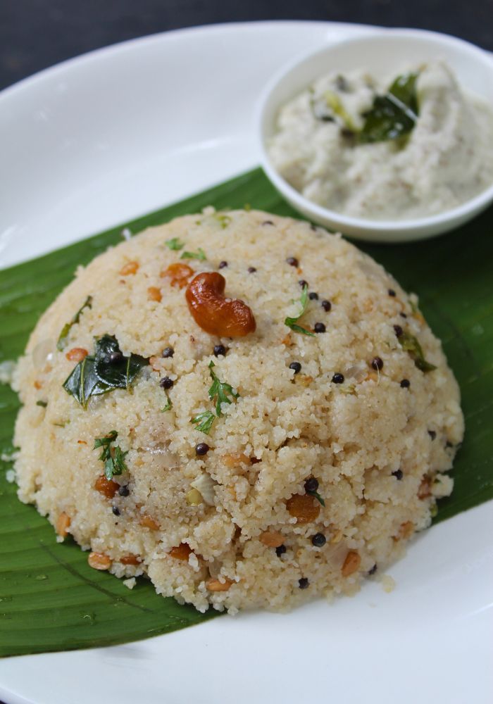 rava upma served in banana leaf with coconut chutney