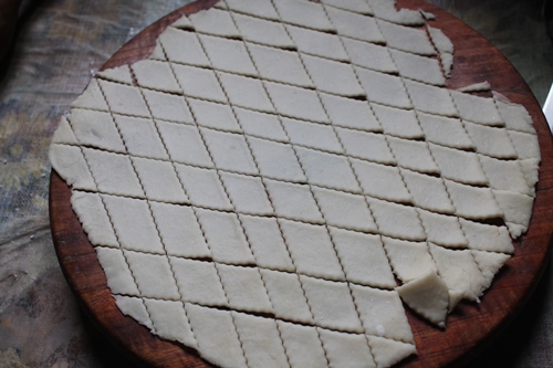 dough cut into diamond like shapes