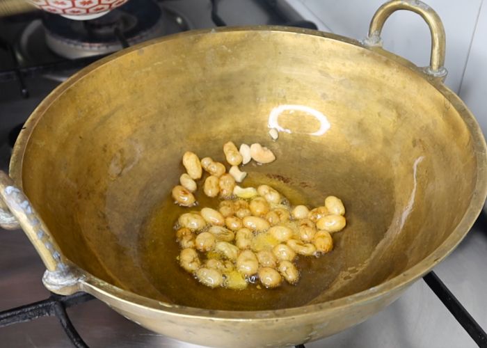 fry nuts till golden