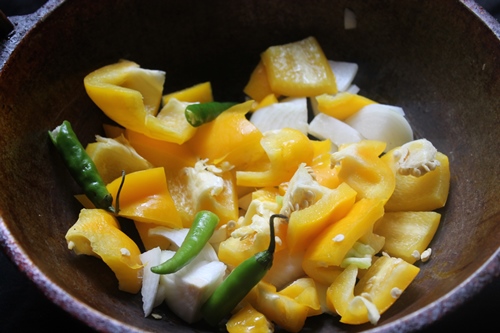 saute yellow capsicum