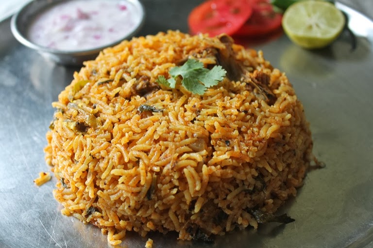 chicken biryani served with raita