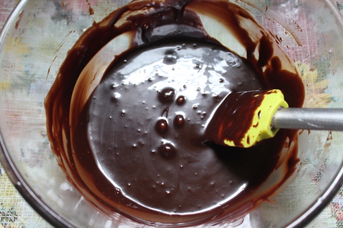 pour melted chocolate in a bowl and leave it to cool