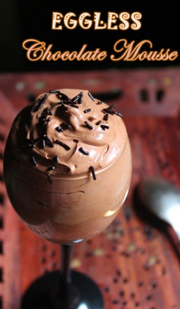 eggless chocolate mousse served in a stem glass with chocolate sprinkles on top