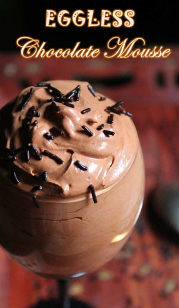 eggless chocolate mousse served in a stem glass with chocolate sprinkles on top