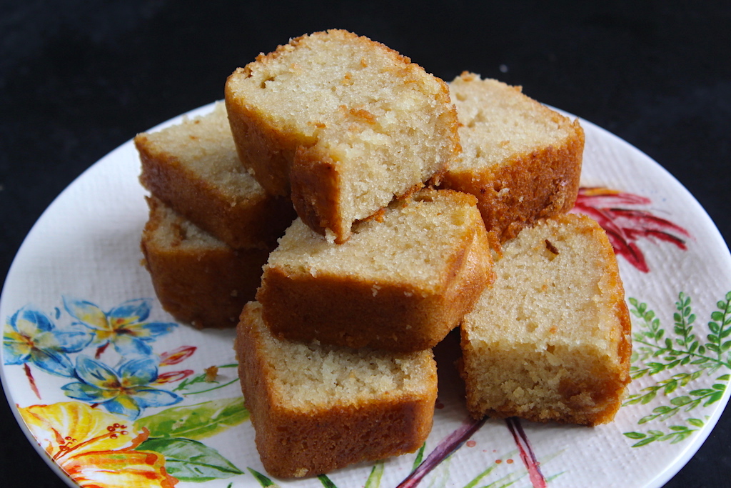 slices of eggless vanilla cake served on a plate