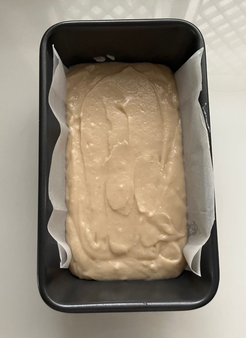 eggless vanilla cake batter in a loaf pan