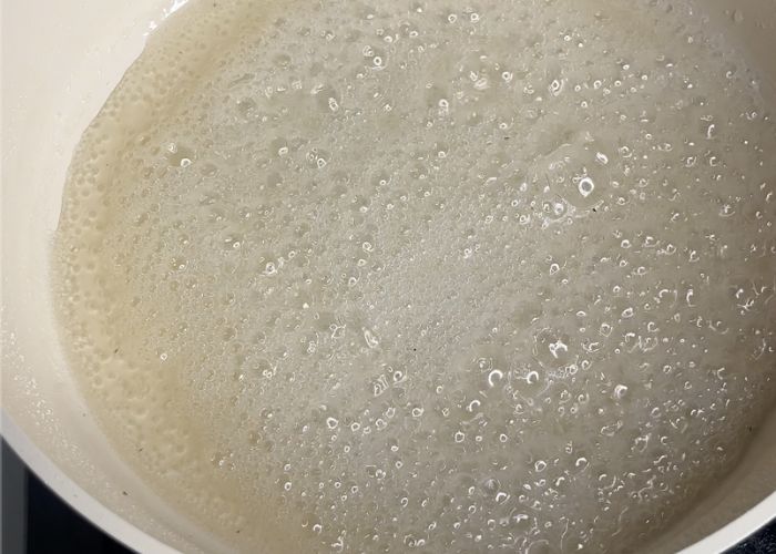 cook sugar until one string consistency
