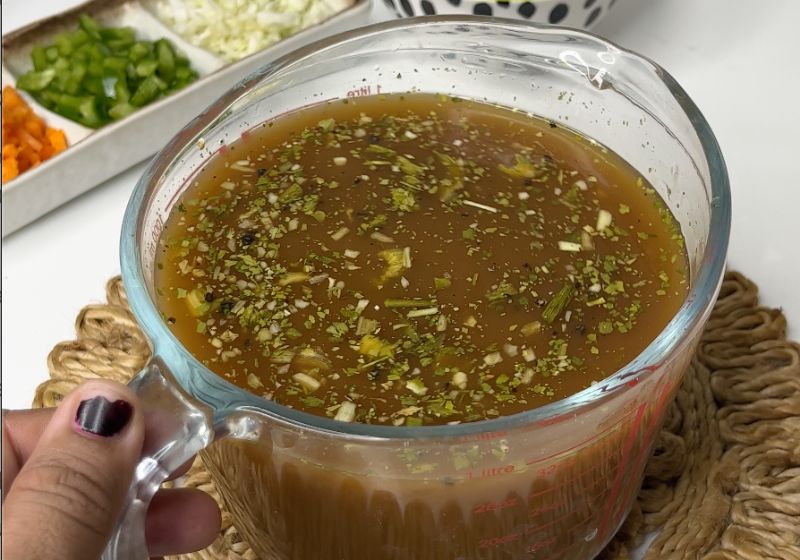 chicken hot and sour stock ready to be used in soup