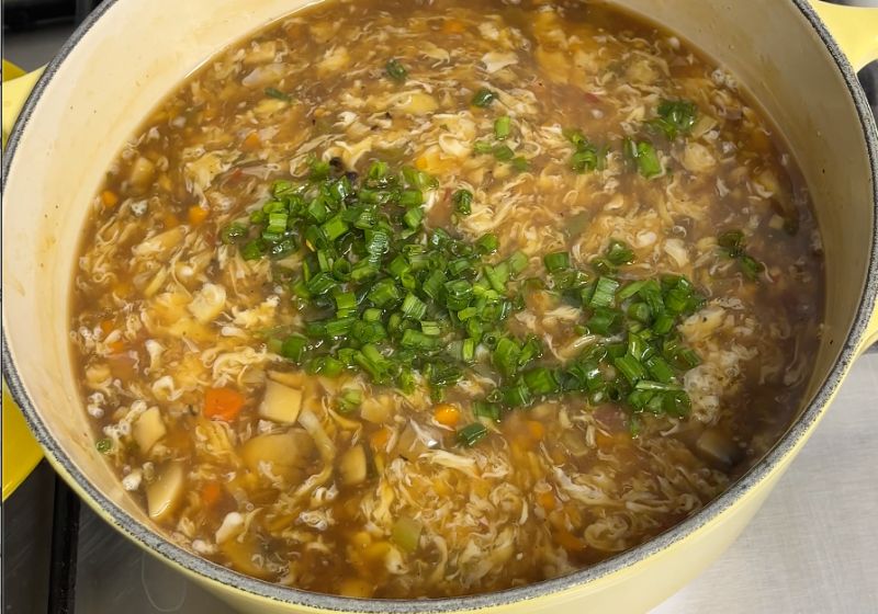 add chopped spring onions into the soup