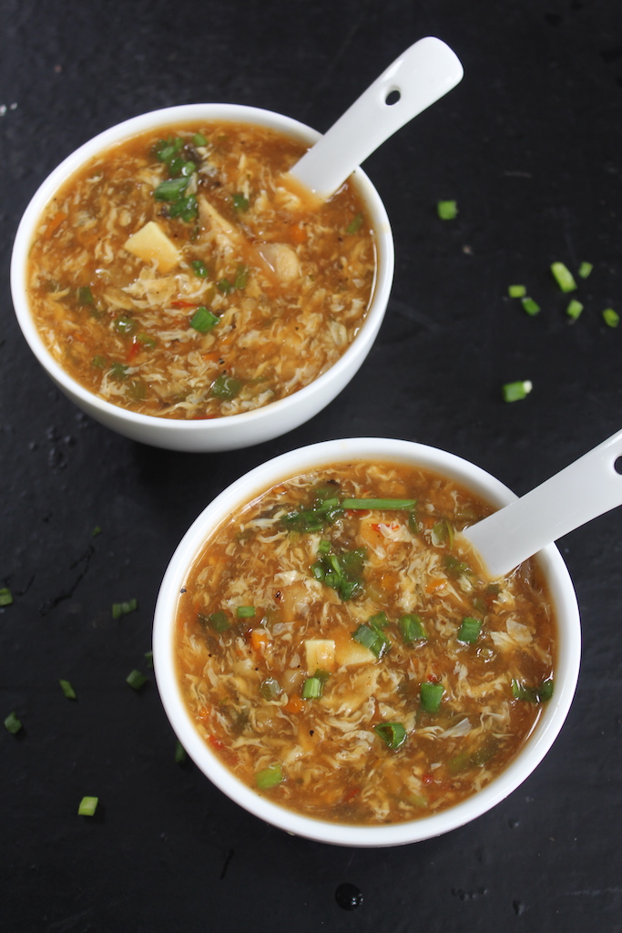 two servings of chicken hot and sour soup served in a soup bowl