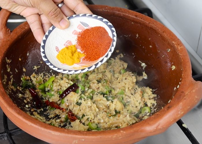 add turmeric and chilli powder for making Puli Inji