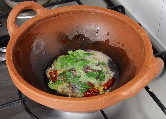 add tempering spices