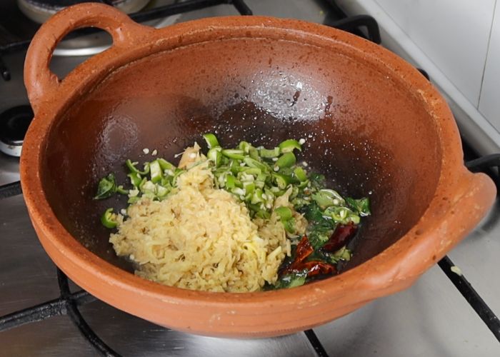 add grated ginger and green chillies