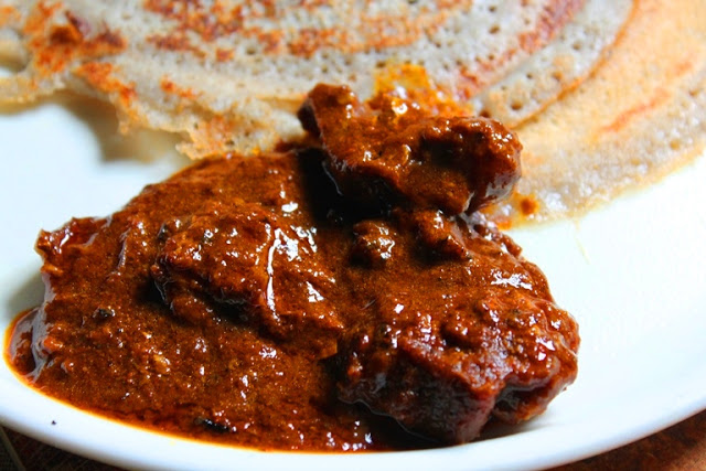 serving laal maas with roti