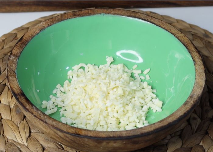 add cheese in a bowl