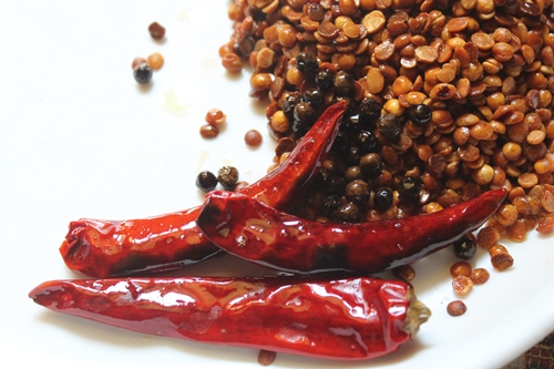 remove toasted chillies to a plate