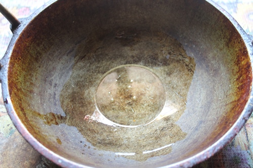 heat oil in a kadai