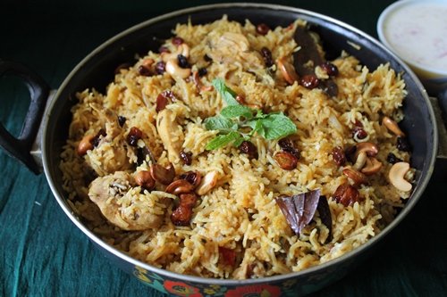 serve chicken biryani with raita