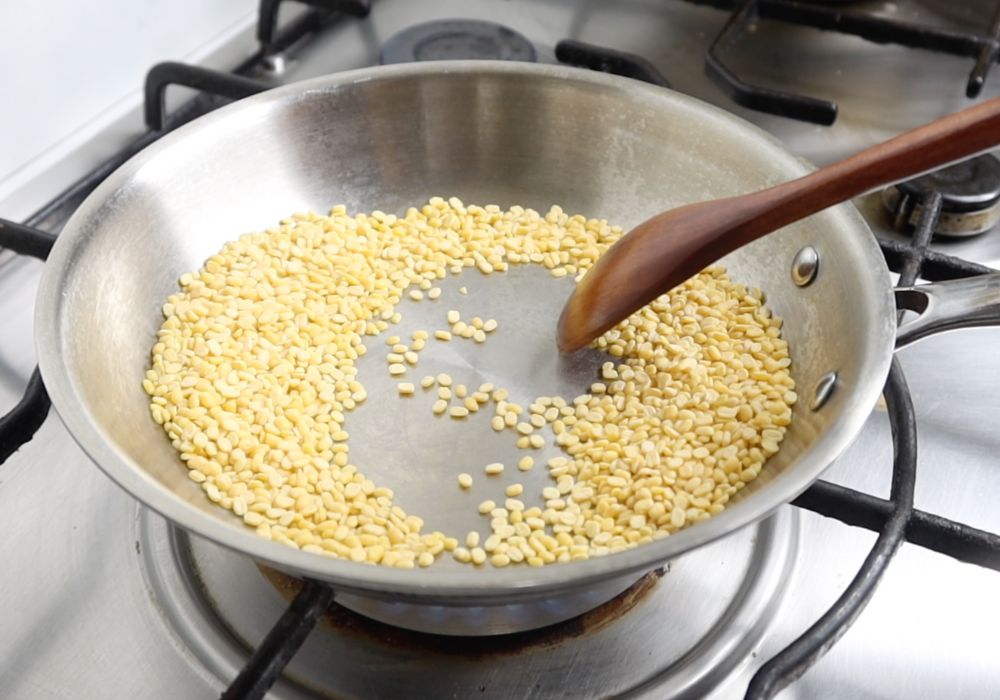 dry roasting moong dal in a pan