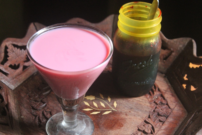 beetroot rose milk is served in a glass