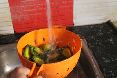 wash bitter gourd really well