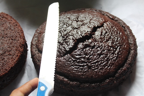 use serrated knife to slice top of cake