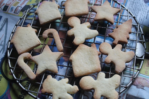 sugar cookies are cooling in wire rack