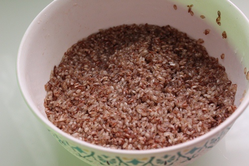 red rice is washed well