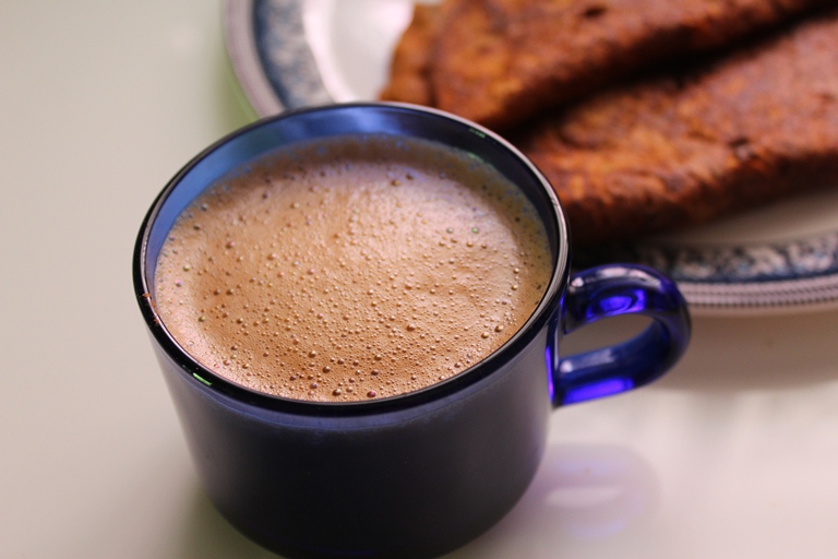 mocha hot cocoa is served in a blue mug