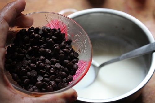 semi sweet chocolate chips are added in hot milk