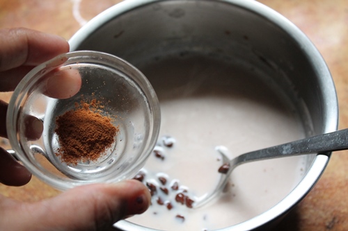 dash of ground cinnamon goes in hot chocolate