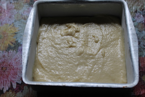 pour cake batter in baking pan