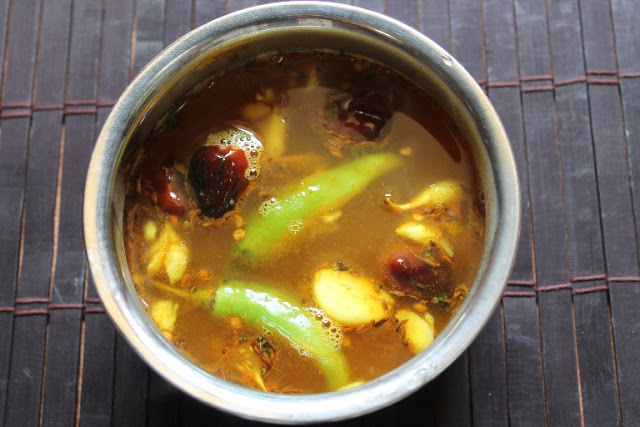 lemon rasam served with hot rice