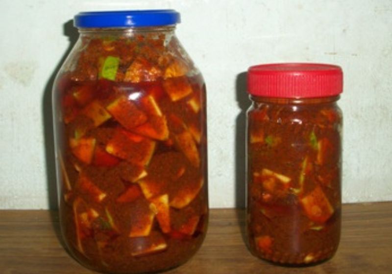 mango pickle or avakaya pickle stored in bottle