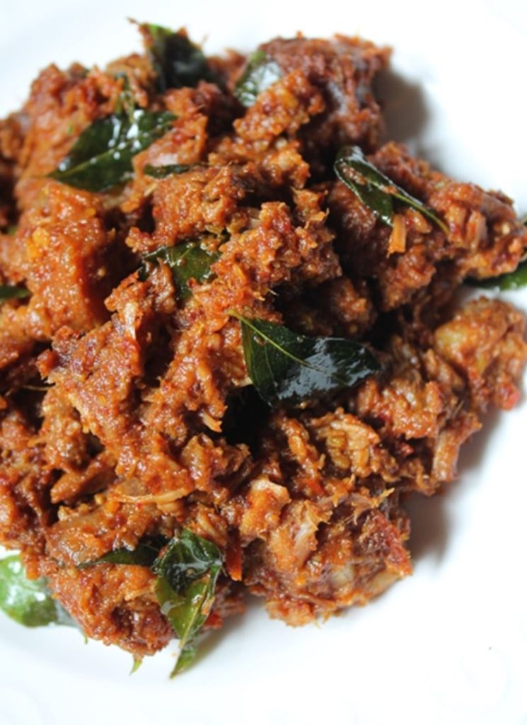 spicy Mutton Sukka served hot in a plate