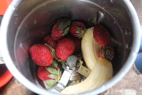 strawberries and banana in a blender