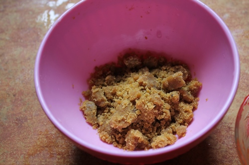 take jaggery in a bowl