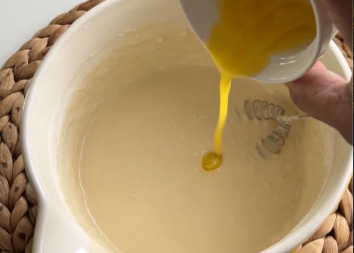 add in melted butter to the pancake batter