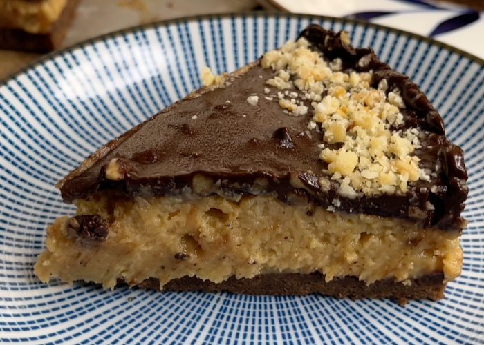 a slice of Peanut Butter Cheesecake