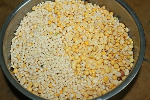 lets make rasam bonda batter. this is soaked chana dal and urad dal