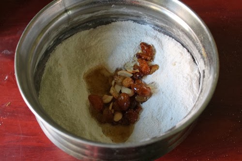 add nuts along with ghee in to the powdered sooji