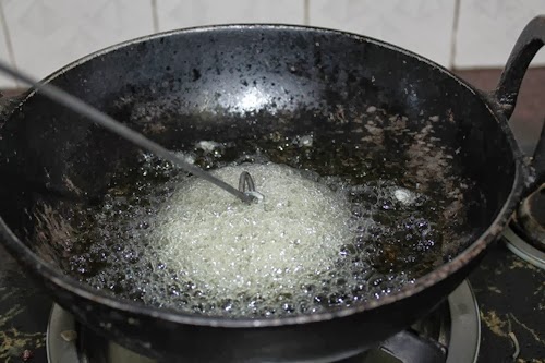 fry achappam mould in oil