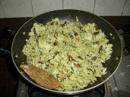 add cooked rice and mix with thokku