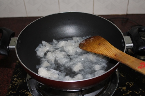 take soaked china grass in a kadai and cook