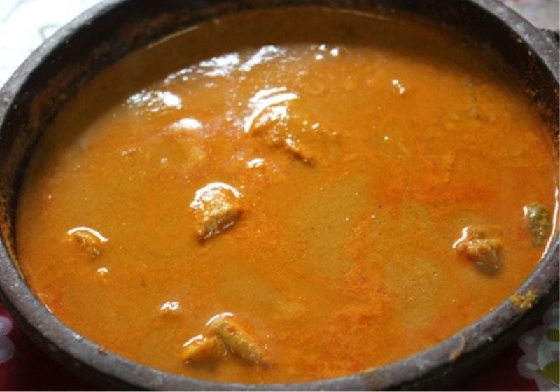 cook malabar fish curry on low heat till fish is cooked