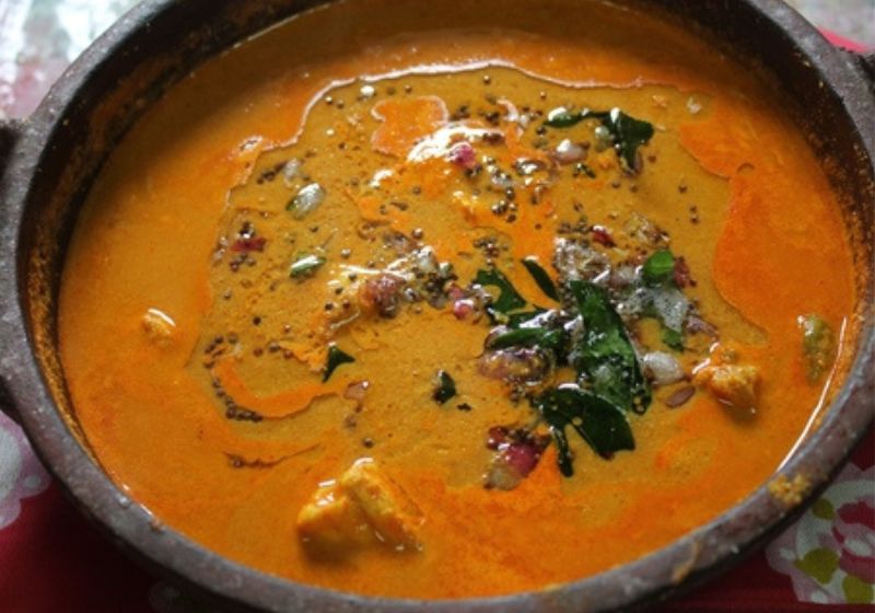 malabar fish curry topped with tempering