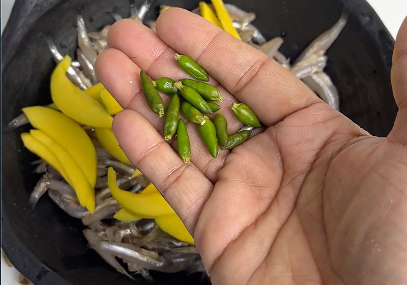 add green chillies to Meen Peera | Nethili Meen Avial Recipe