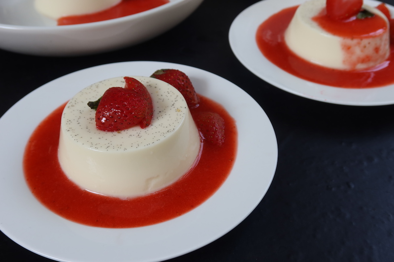 Panna cotta served with strawberry sauce